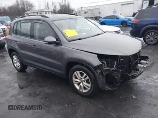 2016 Volkswagen Tiguan SE z VIN WVGBV7AX9GW594282, wystawiony jako IAAI lot #41088680 z przebiegiem 119 444 mil mil oraz . Historia ofert i sprzedaży dostępna na DreamBid. Obrazek 1.