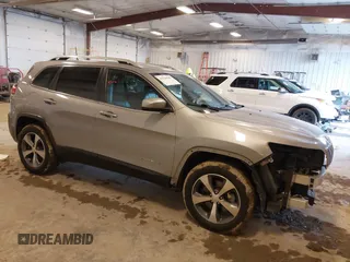 2020 Jeep Cherokee Limited with VIN 1C4PJMDX7LD595128, listed as a IAAI auction lot 41628564 with 79,207 mi miles. Bid and sale history available at carsss.com. Image 1.