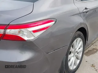 2019 Toyota Camry LE z VIN 4T1B11HK7KU759723, wystawiony jako IAAI lot #41679210 z przebiegiem 35 613 mil mil oraz . Historia ofert i sprzedaży dostępna na DreamBid. Obrazek 20.