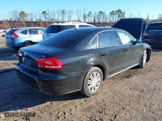 2015 Volkswagen Passat 1.8T S with VIN 1VWAT7A34FC044696, listed as a IAAI auction lot 41578529 with 98,856 mi miles. Bid and sale history available at carsss.com. Image 17.