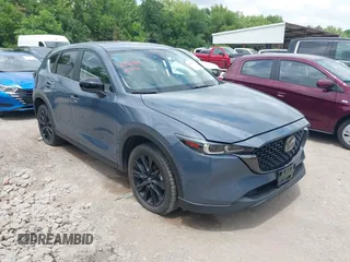 2024 Mazda CX-5 2.5 S Carbon Edition with VIN JM3KFBCL0R0516680, listed as a IAAI auction lot 42140335 with 30,170 mi miles. Bid and sale history available at carsss.com. Image 1.