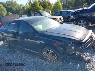 2020 Volkswagen Jetta SEL z VIN 3VWE57BU2LM093697, wystawiony jako IAAI lot #40437984 z przebiegiem 76 803 mil mil oraz . Historia ofert i sprzedaży dostępna na DreamBid. Obrazek 14.