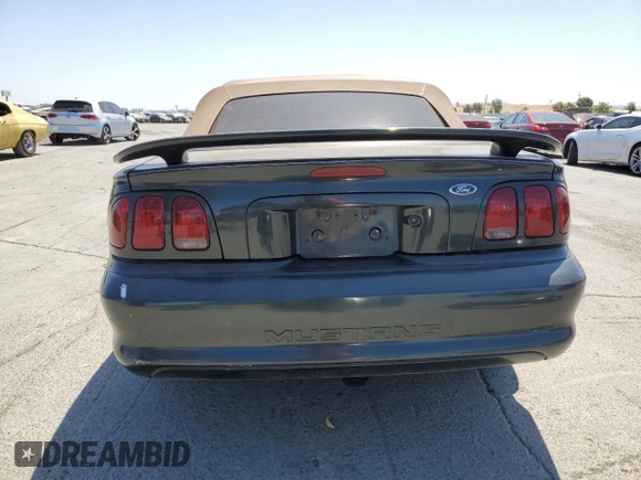 1998 Ford Mustang with VIN 1FAFP4447WF156297, listed as a Copart auction lot 60757265 with 61,296 mi miles and Salvage title. Bid and sale history available at DreamBid. Image 6.