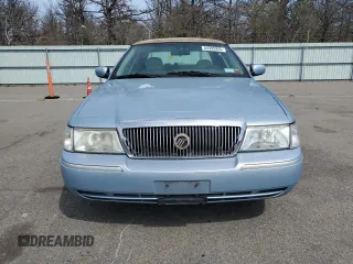 2005 Mercury Grand Marquis GS z VIN 2MEFM74W75X603444, wystawiony jako Copart lot #54395945 z przebiegiem 110 933 mil mil oraz Czysty tytuł • Clean title. Historia ofert i sprzedaży dostępna na DreamBid. Obrazek 5.