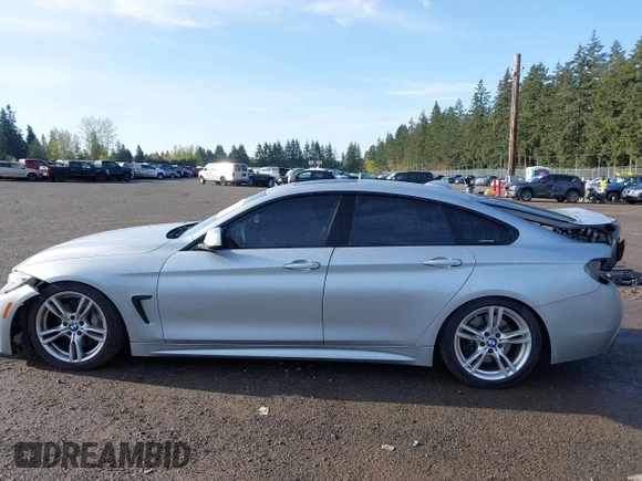 2016 BMW 4 Series 428i xDrive with VIN WBA4C9C5XGG135893, listed as a IAAI auction lot 41976541 with 86,987 mi miles and . Bid and sale history available at carsss.com. Image 15.