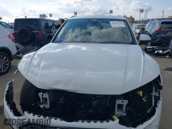 2023 Audi Q5 S line Premium Plus z VIN WA1EAAFY4P2175625, wystawiony jako IAAI lot #41483936 z przebiegiem 14 311 mil mil oraz . Historia ofert i sprzedaży dostępna na DreamBid. Obrazek 13.