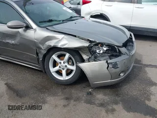 2006 Nissan Altima SL z VIN 1N4BL11D96C251717, wystawiony jako IAAI lot #41566215 z przebiegiem 189 431 mil mil oraz . Historia ofert i sprzedaży dostępna na DreamBid. Obrazek 6.