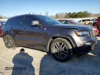 2021 Jeep Grand Cherokee Trailhawk with VIN 1C4RJFLG5MC627975, listed as a Copart auction lot 83080204 with 83,642 mi miles and Salvage Title. Bid and sale history available at carsss.com. Image 4.