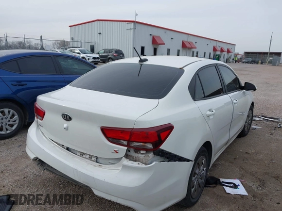 2019 Kia Rio S with VIN 3KPA24ABXKE215756, listed as a IAAI auction lot 41556461 with 122,300 mi miles. Bid and sale history available at carsss.com. Image 4.