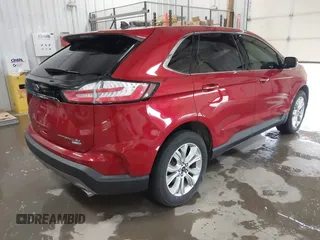 2020 Ford Edge Titanium z VIN 2FMPK4K98LBB39819, wystawiony jako IAAI lot #41947377 z przebiegiem 69 467 mil mil oraz . Historia ofert i sprzedaży dostępna na DreamBid. Obrazek 4.
