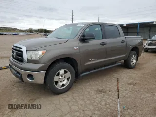 2012 Toyota Tundra with VIN 5TFDY5F14CX255771, listed as a Copart auction lot 53575575 with 174,821 mi miles and Salvage title. Bid and sale history available at DreamBid. Image 1.
