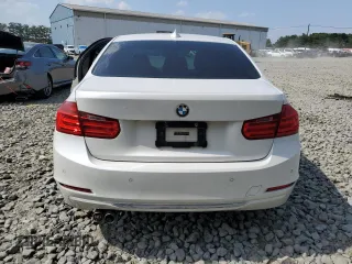 2015 BMW 3 Series 328i xDrive with VIN WBA3B3G52FNT19323, listed as a Copart auction lot 61873015 with 110,893 mi miles and Salvage title. Bid and sale history available at DreamBid. Image 6.