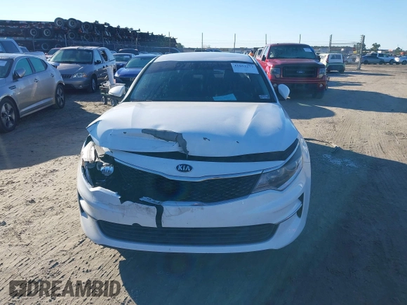 2016 Kia Optima LX with VIN 5XXGT4L36GG005859, listed as a IAAI auction lot 41053277 with 127,783 mi miles. Bid and sale history available at carsss.com. Image 12.