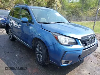 2017 Subaru Forester Touring with VIN JF2SJGWC5HH567870, listed as a IAAI auction lot 42007542 with 76,560 mi miles. Bid and sale history available at carsss.com. Image 1.