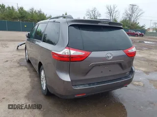 2015 Toyota Sienna XLE with VIN 5TDYK3DC8FS651580, listed as a IAAI auction lot 41971867 with 49,711 mi miles. Bid and sale history available at carsss.com. Image 3.