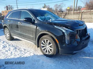 2021 Cadillac XT4 AWD Premium Luxury z VIN 1GYFZDR43MF047162, wystawiony jako IAAI lot #41328848 z przebiegiem 16 526 mil mil oraz . Historia ofert i sprzedaży dostępna na DreamBid. Obrazek 1.