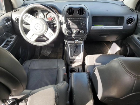 2016 Jeep Compass High Altitude Edition with VIN 1C4NJCEA6GD720251, listed as a Copart auction lot 42423475 with 103,312 mi miles and Salvage Title. Bid and sale history available at carsss.com. Image 8.