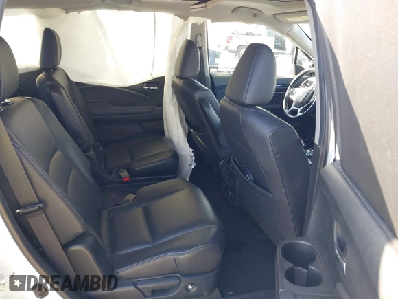 2022 Honda Pilot Touring 7-Passenger with VIN 5FNYF6H67NB017660, listed as a IAAI auction lot 41194603 with 87,301 mi miles. Bid and sale history available at carsss.com. Image 8.
