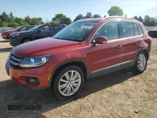2014 Volkswagen Tiguan SE with VIN WVGAV3AX9EW038118, listed as a Copart auction lot 56329625 with 134,620 mi miles and Salvage title. Bid and sale history available at DreamBid. Image 1.