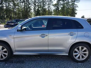 2012 Mitsubishi Outlander SE with VIN JA4AR4AU9CZ006957, listed as a IAAI auction lot 42414611 with 188,439 mi miles and . Bid and sale history available at DreamBid. Image 15.