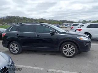 2011 Mazda CX-9 Grand Touring with VIN JM3TB2DAXB0300466, listed as a IAAI auction lot 41921411 with 196,257 mi miles. Bid and sale history available at carsss.com. Image 13.