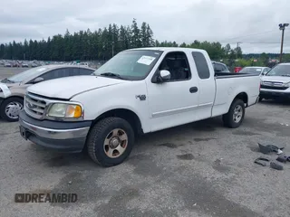 2002 Ford F-150 XL with VIN 1FTRX17L32NA19687, listed as a IAAI auction lot 42577258 with 216,685 mi miles and . Bid and sale history available at DreamBid. Image 2.