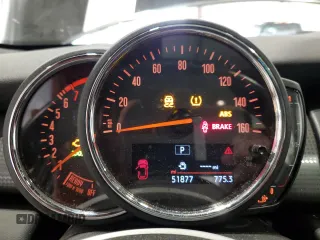 2021 MINI Hardtop 4 Door Oxford Edition with VIN WMWXU7C00M2N49230, listed as a Copart auction lot 77797914 with 51,877 mi miles and Salvage title. Bid and sale history available at DreamBid. Image 9.