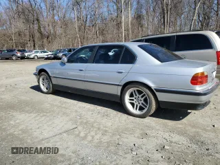 2000 BMW 7 Series 740iL with VIN WBAGH8341YDP12958, listed as a Copart auction lot 48118615 with 0 mi miles and Salvage Title. Bid and sale history available at carsss.com. Image 2.