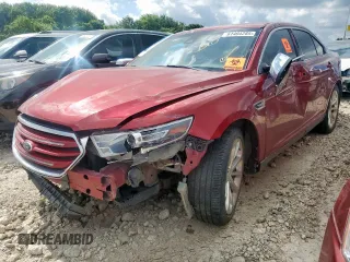 2014 Ford Taurus Limited with VIN 1FAHP2F89EG186567, listed as a Copart auction lot 61404285 with 188,890 mi miles and Salvage title. Bid and sale history available at DreamBid. Image 1.