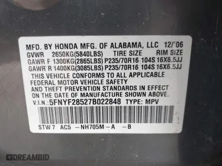 2007 Honda Pilot EX-L with VIN 5FNYF28527B022848, listed as a IAAI auction lot 42010116 with 240,277 mi miles. Bid and sale history available at carsss.com. Image 9.