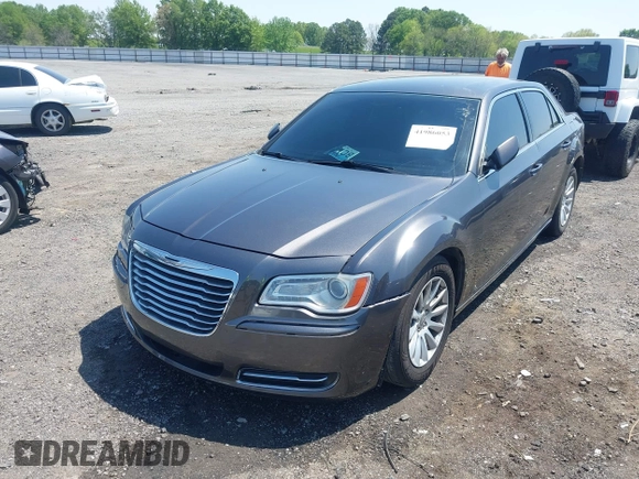 2014 Chrysler 300 with VIN 2C3CCAAG3EH237157, listed as a IAAI auction lot 41986053 with 61,372 mi miles and . Bid and sale history available at DreamBid. Image 6.