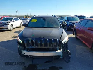 2016 Jeep Cherokee Sport with VIN 1C4PJLAS4GW329773, listed as a IAAI auction lot 41300023 with 101,912 mi miles and . Bid and sale history available at DreamBid. Image 13.