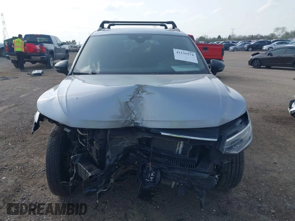 2022 Volkswagen Tiguan SE R-Line Black with VIN 3VV8B7AX7NM030703, listed as a IAAI auction lot 42135974 with 57,116 mi miles and . Bid and sale history available at DreamBid. Image 13.