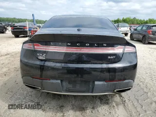 2019 Lincoln MKZ Reserve II z VIN 3LN6L5E98KR617764, wystawiony jako Copart lot #53246005 z przebiegiem 108 017 mil mil oraz Tytuł czysty. Historia ofert i sprzedaży dostępna na DreamBid. Obrazek 6.