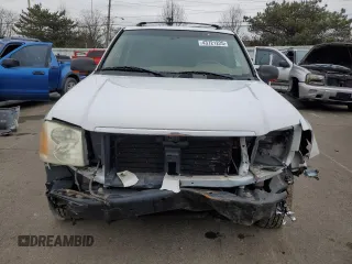 2003 GMC Envoy SLT with VIN 1GKDT13S332293112, listed as a Copart auction lot 43721225 with 139,471 mi miles and Salvage Title. Bid and sale history available at carsss.com. Image 5.
