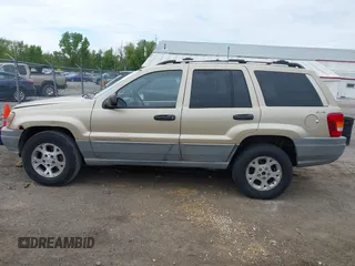 2000 Jeep Grand Cherokee Laredo with VIN 1J4GW48SXYC100248, listed as a IAAI auction lot 42182318 with 227,658 mi miles and . Bid and sale history available at DreamBid. Image 14.