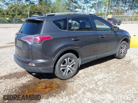 2016 Toyota RAV4 LE with VIN JTMZFREV5GJ078051, listed as a IAAI auction lot 41858381 with 97,032 mi miles and . Bid and sale history available at DreamBid. Image 4.