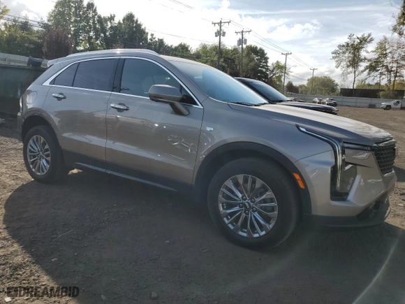2024 Cadillac XT4 AWD Premium Luxury with VIN 1GYFZDR40RF219252, listed as a Copart auction lot 72446334 with 2,544 mi miles and Salvage Title. Bid and sale history available at carsss.com. Image 4.