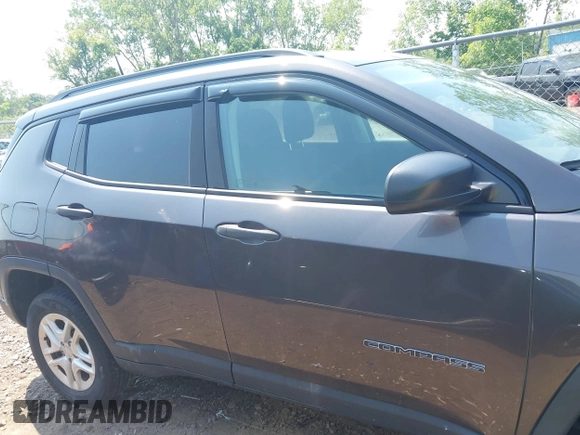 2018 Jeep Compass Sport with VIN 3C4NJDAB7JT235218, listed as a IAAI auction lot 42473771 with 106,302 mi miles and . Bid and sale history available at DreamBid. Image 13.