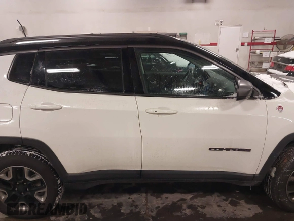2018 Jeep Compass Trailhawk with VIN 3C4NJDDB2JT328269, listed as a IAAI auction lot 41597957 with 66,789 mi miles and . Bid and sale history available at carsss.com. Image 13.