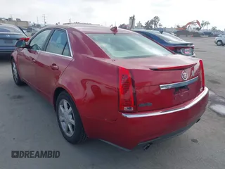 2009 Cadillac CTS AWD w/1SA with VIN 1G6DG577990113572, listed as a IAAI auction lot 42110784 with 229,692 mi miles. Bid and sale history available at carsss.com. Image 3.
