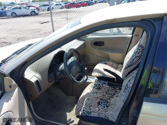 1996 Saturn SL with VIN 1G8ZH5288TZ230864, listed as a IAAI auction lot 42116703 with 104,387 mi miles. Bid and sale history available at carsss.com. Image 5.