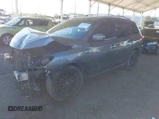 2019 Nissan Pathfinder SL with VIN 5N1DR2MN3KC590250, listed as a IAAI auction lot 41295078 with 104,501 mi miles and . Bid and sale history available at DreamBid. Image 2.