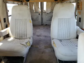 1994 GMC Vandura z VIN 1GDEG25K4RF512695, wystawiony jako Copart lot #63562414 z przebiegiem 171 855 mil mil oraz Szkody całkowita. Historia ofert i sprzedaży dostępna na DreamBid. Obrazek 10.