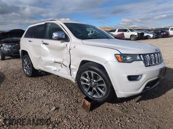 2017 Jeep Grand Cherokee Overland with VIN 1C4RJFCG7HC707767, listed as a Copart auction lot 82345154 with 96,374 mi miles and Salvage Title. Bid and sale history available at carsss.com. Image 4.