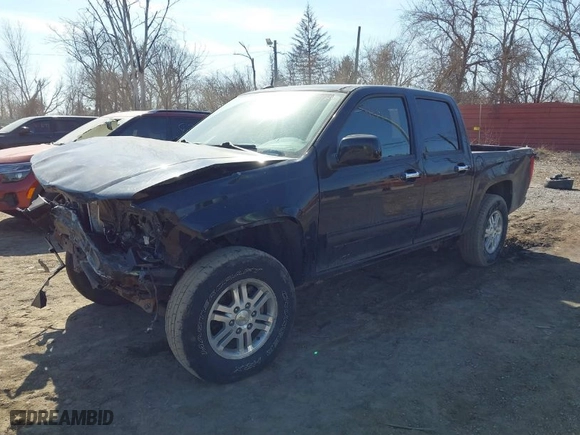 2011 Chevrolet Colorado LT w/1LT with VIN 1GCHTCFE5B8139026, listed as a IAAI auction lot 41786530 with 173,482 mi miles. Bid and sale history available at carsss.com. Image 2.