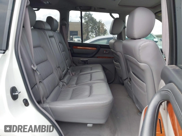 2004 Lexus LX 470 z VIN JTJHT00W043543915, wystawiony jako IAAI lot #41902858 z przebiegiem 110 454 mil mil oraz . Historia ofert i sprzedaży dostępna na DreamBid. Obrazek 8.