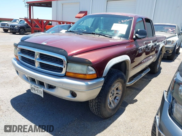 2003 Dodge Dakota SLT with VIN 1D7HG48N43S256520, listed as a IAAI auction lot 42111997 with 218,061 mi miles and . Bid and sale history available at carsss.com. Image 2.