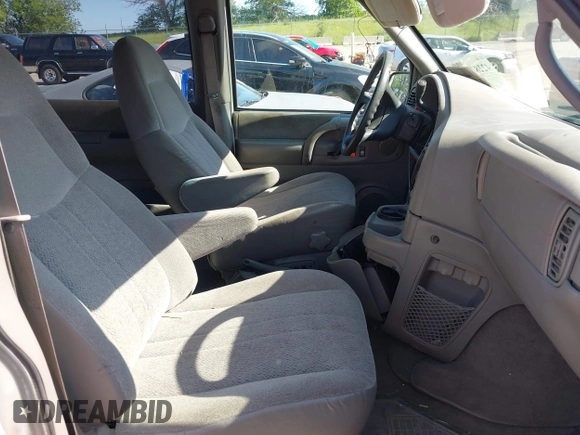 2004 Chevrolet Astro z VIN 1GNEL19X24B104686, wystawiony jako IAAI lot #42281386 z przebiegiem 154 038 mil mil oraz . Historia ofert i sprzedaży dostępna na DreamBid. Obrazek 5.