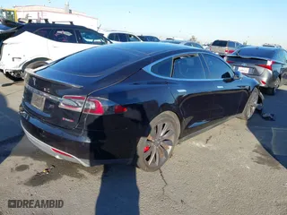 2015 Tesla Model S 85D with VIN 5YJSA1H46FF096603, listed as a IAAI auction lot 41084296 with 114,466 mi miles. Bid and sale history available at carsss.com. Image 4.